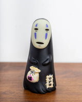 No Face with Pouch