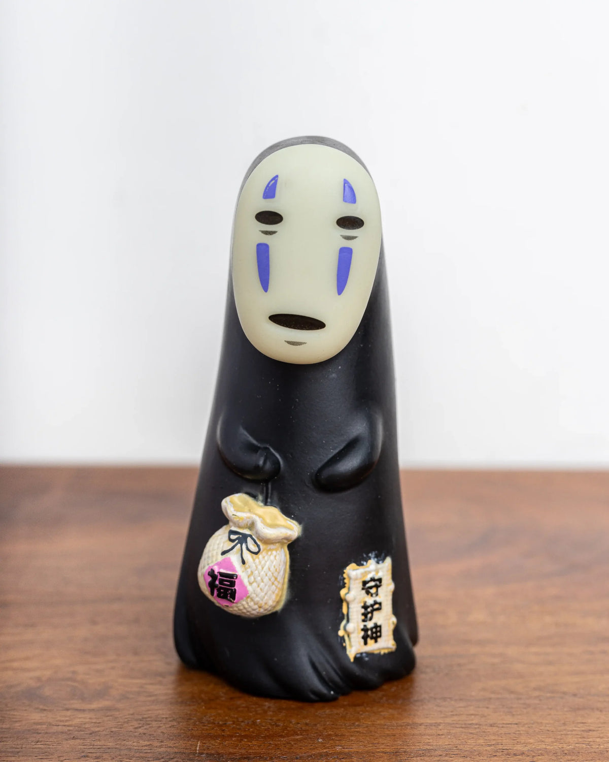 No Face with Pouch